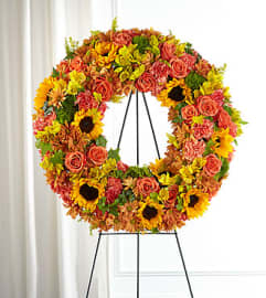Autumnal Memories Wreath. An arrangement by North Liberty Flower Shop.