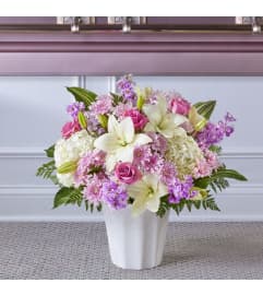 Heaven Scent Floor Basket. An arrangement by North Liberty Flower Shop.