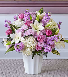 Heaven Scent Floor Basket. An arrangement by North Liberty Flower Shop.