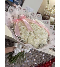 Evelyn roses. An arrangement by Illusion Flower Shop.
