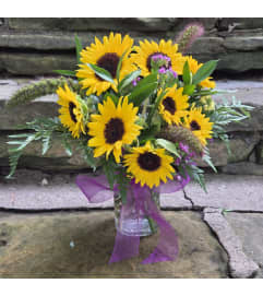 Pocketful of Sunshine. An arrangement by Thompson's Full Bloom.