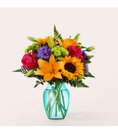 Double Rainbow Bouquet. An arrangement by North Liberty Flower Shop.