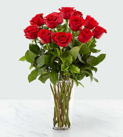 Long Stem Red Roses. An arrangement by North Liberty Flower Shop.