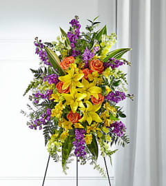 Thoughtful Prayers Easel Spray. An arrangement by North Liberty Flower Shop.