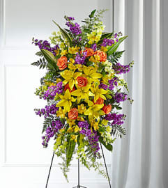 Thoughtful Prayers Easel Spray. An arrangement by North Liberty Flower Shop.