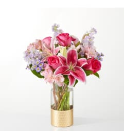 Pressing Petals Bouquet. An arrangement by North Liberty Flower Shop.