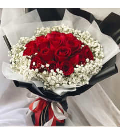 Red and White Rose Wrap. An arrangement by Brickell Exclusive Blooms.