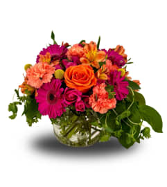 Sunrise Sensation. An arrangement by Flowers of Jacksonville.