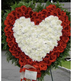 Pure Love Tribute. An arrangement by New Britain Flower Shop.