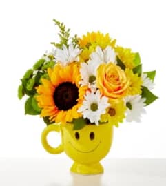 Be Happy Bouquet. An arrangement by North Liberty Flower Shop.