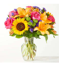 Radiant Joy Bouquet. An arrangement by Love Story Florist.