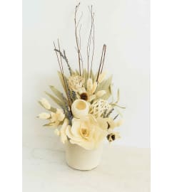 Hint of Lavender Dried Arrangement. An arrangement by Anderson Flowers.