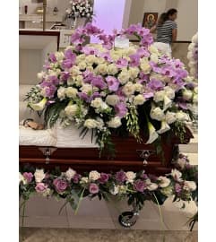 Serene Orchid and Rose Harmony. An arrangement by Simply Beautiful Flowers and Events.