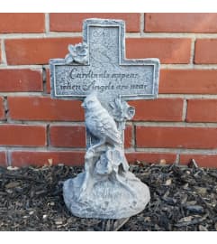 Cardinal Cross. An arrangement by North Liberty Flower Shop.