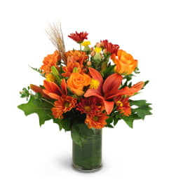 Autumn Awakening. An arrangement by Julie's Artistic Rose.