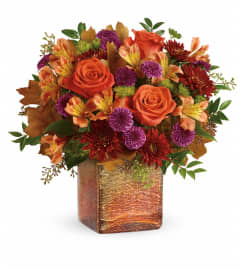 Teleflora's Golden Amber Bouquet T17T300A. An arrangement by Jennifer's Flowers and Gifts.