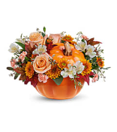 Teleflora's Hello Pumpkin Bouquet. An arrangement by Love Floral.