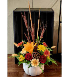 Rustic Autumn Charm. An arrangement by Avenue Florist. Rustic Autumn Charm. An arrangement by Avenue Florist.