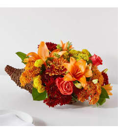 Basket of Blessings. An arrangement by Palmetto Gardens Florist.