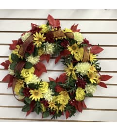 Falling for You Wreath. An arrangement by Roma Flowers and Gifts.