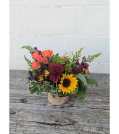Rustic Radiance. An arrangement by The Garden Gate Gifts and Florals.