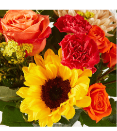 FTD Sweater Season-Florist Original. An arrangement by Fellows Fernlea Flowers.
