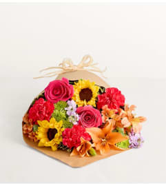 Sunshine Bloom Bouquet. An arrangement by Elegant Florist.