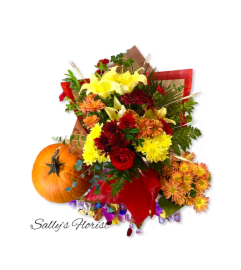 Teleflora's Hello Pumpkin Bouquet. An arrangement by Jimmy's Flower Shop.