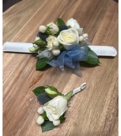 Winter Whispers Corsage. An arrangement by Lily Pad Florist.