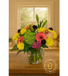 Brightside. An arrangement by Lori's Hearts and Flowers.