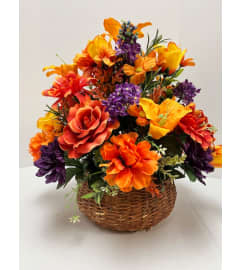 Silk Fall Basket with Handle. An arrangement by Amedeo's Florist.