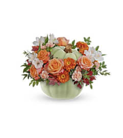 Teleflora's Whimsy Pumpkin. An arrangement by Love Story Florist.