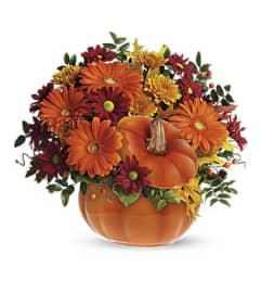 Pumpkin Spice Blooms. An arrangement by Flore's Shop. Pumpkin Spice Blooms. An arrangement by Flore's Shop.