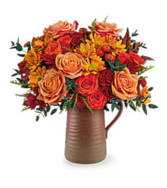 Rustic Sunset Charm. An arrangement by Flore's Shop.