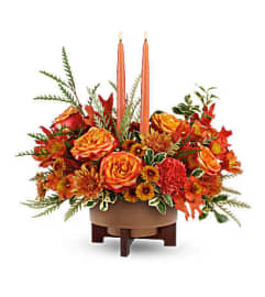 Harvest Flame Centerpiece. An arrangement by Flore's Shop.