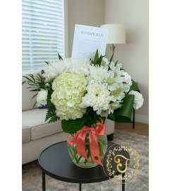 Solace – Curated Story Card Collection. An arrangement by Anderson Flowers.