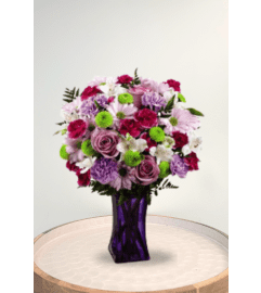 Purple Pop. An arrangement by Blossoms On The Trail.