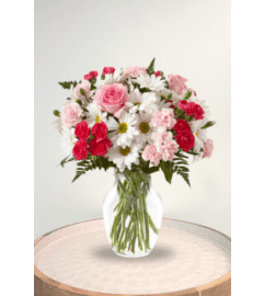 Sweet Surprises. An arrangement by Blossoms On The Trail. Sweet Surprises. An arrangement by Blossoms On The Trail.