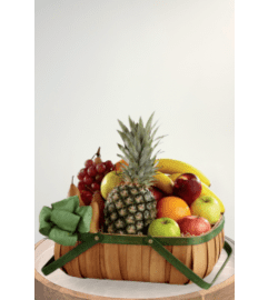 A Thoughtful Gesture Fruit Basket. An arrangement by Blossoms On The Trail.