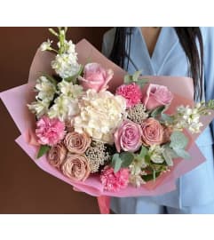 #35 Blush Elegance. An arrangement by Blossy Flowers.