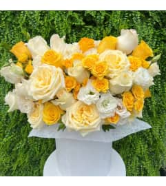 #12 Feliz. An arrangement by Blossy Flowers.