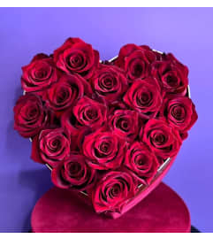 #18 Heart. An arrangement by Blossy Flowers.