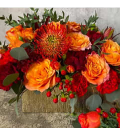 #29 Always Orange. An arrangement by Blossy Flowers.