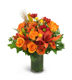 Autumn Awakening. An arrangement by Matles Florist. Autumn Awakening. An arrangement by Matles Florist.