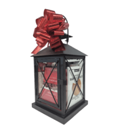 Lantern and Wine Gift Basket. An arrangement by Aurora Greenhouse.