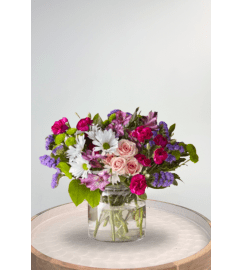 CGL FTD Wildberry Bouquet. An arrangement by Blossoms On The Trail.