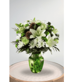 Holiday Winter Bliss. An arrangement by Blossoms On The Trail.