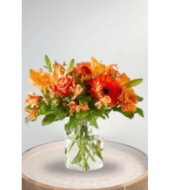 Fall for you- Autumn. An arrangement by Blossoms On The Trail.