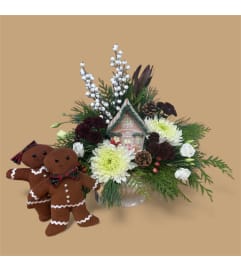 Warm Gingerbread Cottage. An arrangement by In Bloom.
