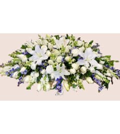 Heavenly Grace Casket Spray. An arrangement by Geni's Florist and Gifts. Heavenly Grace Casket Spray. An arrangement by Geni's Florist and Gifts.